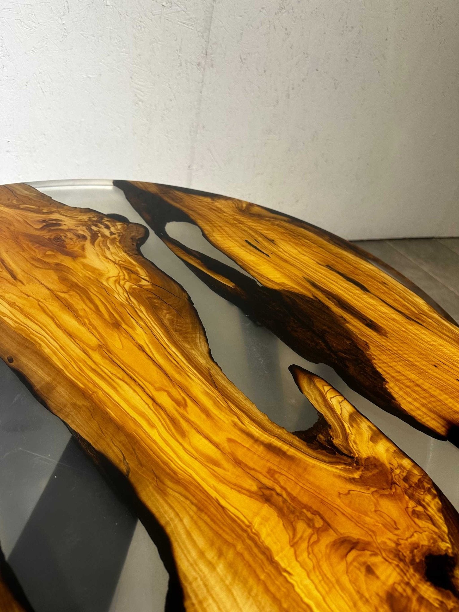 Coffee table epoxy resin olive wood around 80 cm-black-transparent